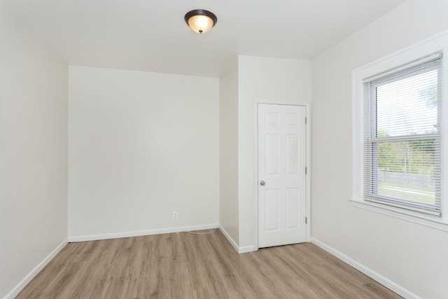 2514 Lothrop St, Detroit, MI 48206 - empty room featuring light wood-style flooring and baseboards