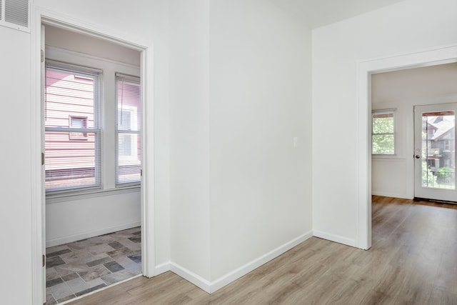 2514 Lothrop St, Detroit, MI 48206 - empty room featuring light wood-style flooring and baseboards