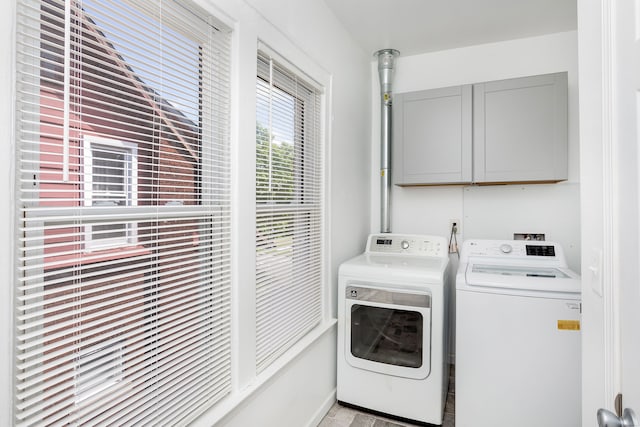 2514 Lothrop St, Detroit, MI 48206 - laundry area featuring cabinet space and separate washer and dryer