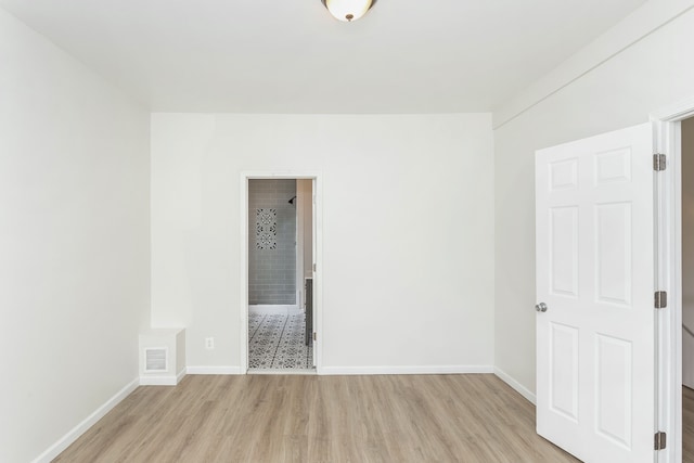2514 Lothrop St, Detroit, MI 48206 - unfurnished room featuring light wood finished floors and baseboards