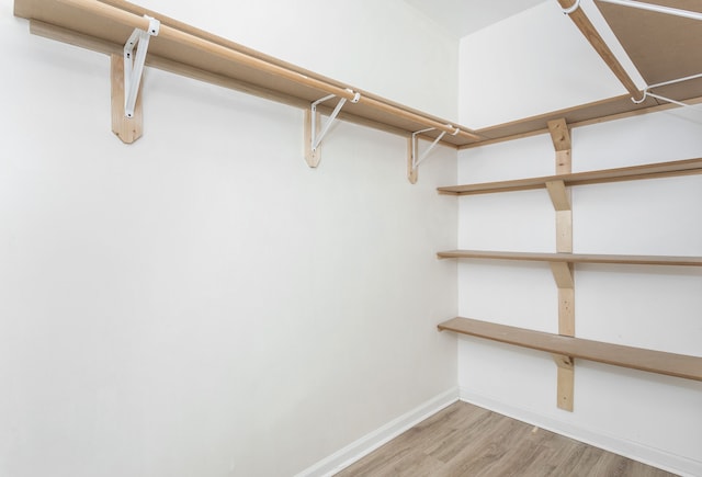 2514 Lothrop St, Detroit, MI 48206 - walk in closet with wood finished floors