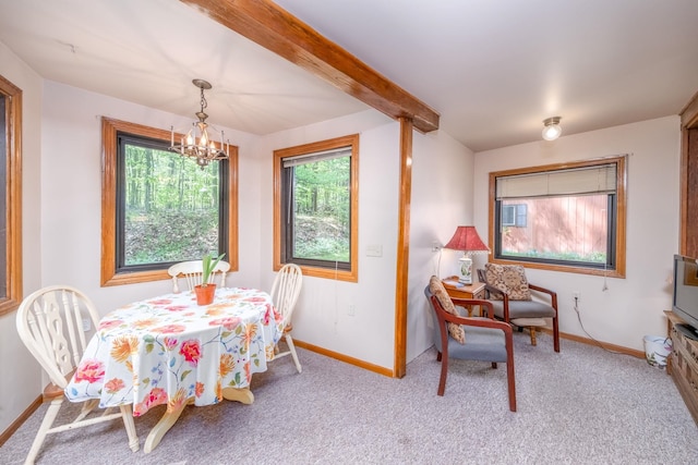 16545 Lonesome Trl, Leroy, MI 49655 - carpeted dining area with a chandelier, baseboards, and beamed ceiling