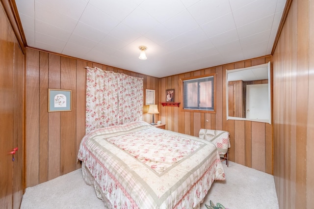 16545 Lonesome Trl, Leroy, MI 49655 - carpeted bedroom with wood walls