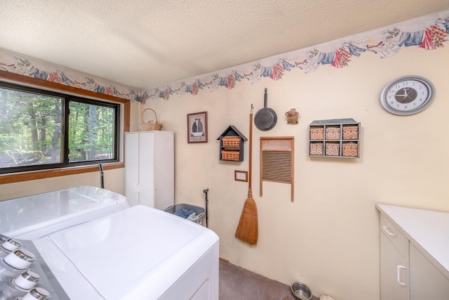 16545 Lonesome Trl, Leroy, MI 49655 - carpeted bedroom featuring independent washer and dryer and a textured ceiling