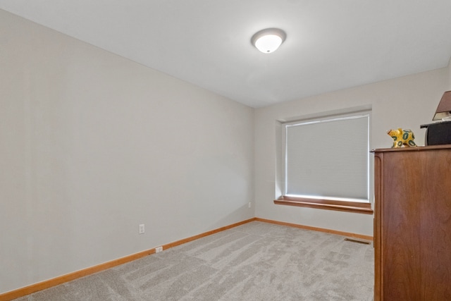 28301 Katie Rd, Chesterfield, MI 48047 - spare room featuring baseboards and light carpet