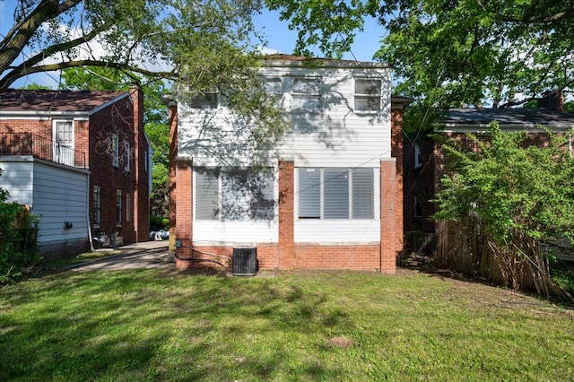 18611 Pinehurst St, Detroit, MI 48221 - rear view of house featuring a lawn and cooling unit