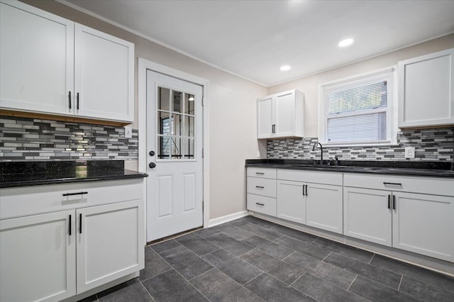 18611 Pinehurst St, Detroit, MI 48221 - kitchen featuring a sink, tasteful backsplash, baseboards, recessed lighting, and ornamental molding