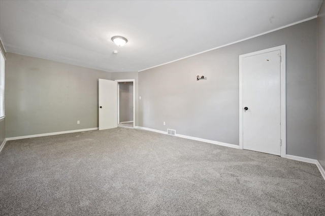18611 Pinehurst St, Detroit, MI 48221 - carpeted spare room featuring baseboards and ornamental molding