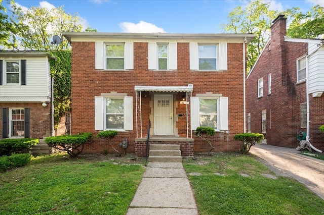 18611 Pinehurst St, Detroit, MI 48221 - view of front of property with brick siding and a front yard