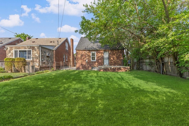back of property featuring brick siding
