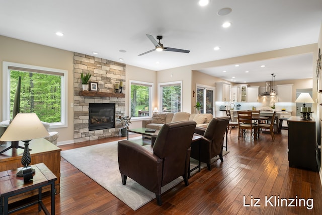 966 Timber Winds Dr SW, Grand Rapids, MI 49534 - living area with a ceiling fan, a fireplace, plenty of natural light, dark wood-type flooring, and recessed lighting