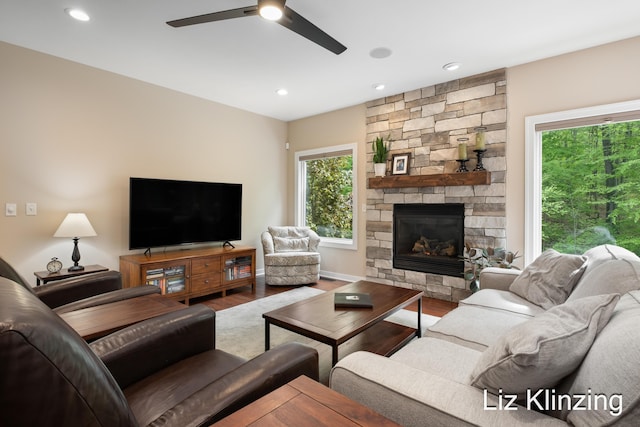 966 Timber Winds Dr SW, Grand Rapids, MI 49534 - living room featuring ceiling fan, wood finished floors, a fireplace, recessed lighting, and baseboards