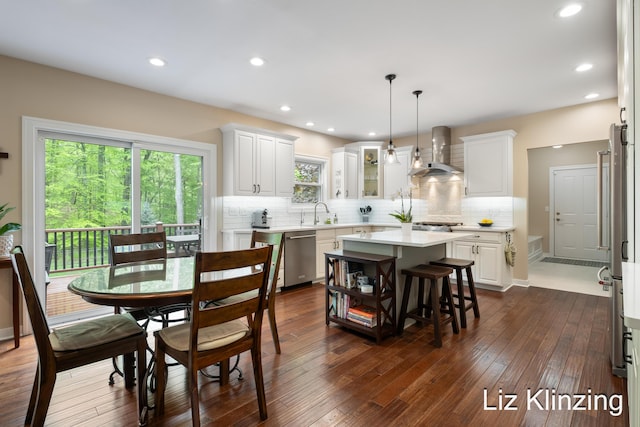 966 Timber Winds Dr SW, Grand Rapids, MI 49534 - dining area with dark wood-style flooring, recessed lighting, and baseboards