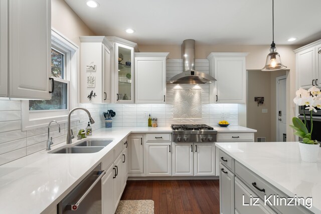 966 Timber Winds Dr SW, Grand Rapids, MI 49534 - kitchen with wall chimney exhaust hood, stainless steel appliances, a sink, recessed lighting, and white cabinetry
