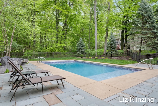 966 Timber Winds Dr SW, Grand Rapids, MI 49534 - view of swimming pool featuring a patio and a fenced backyard