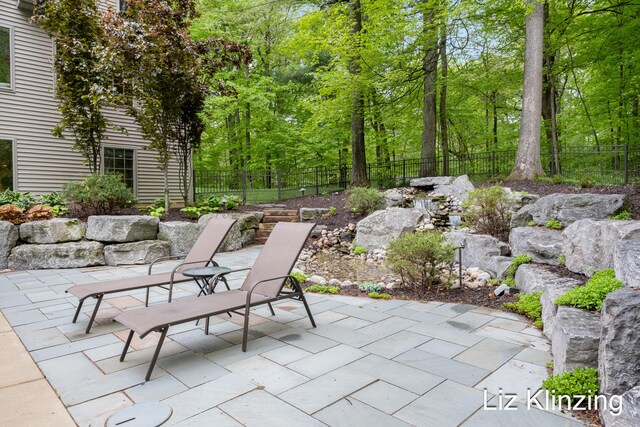 966 Timber Winds Dr SW, Grand Rapids, MI 49534 - fenced backyard featuring a patio area