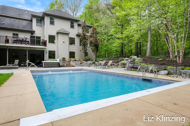 966 Timber Winds Dr SW, Grand Rapids, MI 49534 - outdoor pool featuring a jacuzzi and a patio