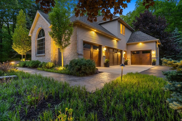 966 Timber Winds Dr SW, Grand Rapids, MI 49534 - view of front of property with a garage and concrete driveway