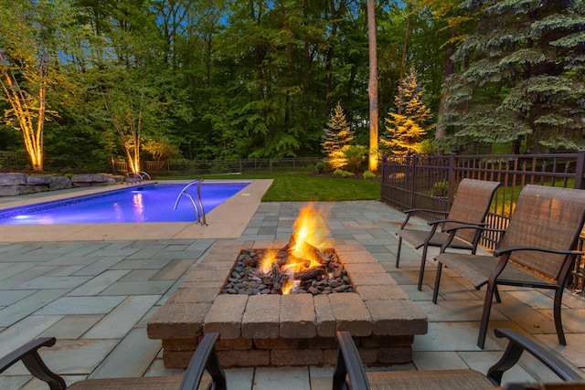 966 Timber Winds Dr SW, Grand Rapids, MI 49534 - view of swimming pool featuring a fire pit, a patio, and a fenced backyard