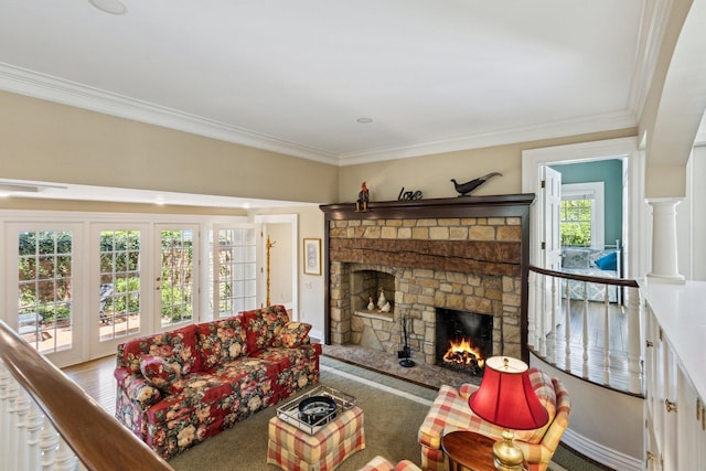 602 N Kalamazoo Ave, Marshall, MI 49068 - living area featuring a stone fireplace and ornamental molding