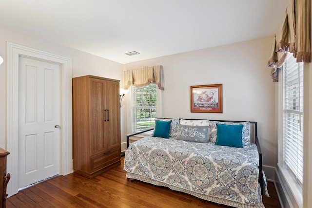 602 N Kalamazoo Ave, Marshall, MI 49068 - bedroom featuring dark wood-style flooring