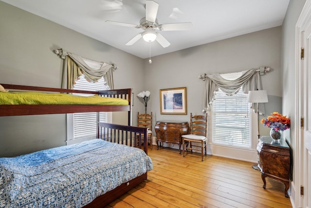 602 N Kalamazoo Ave, Marshall, MI 49068 - bedroom featuring light wood-style flooring, ceiling fan, and baseboards