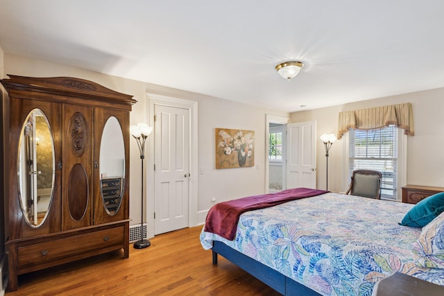 602 N Kalamazoo Ave, Marshall, MI 49068 - bedroom with wood finished floors