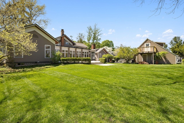 602 N Kalamazoo Ave, Marshall, MI 49068 - view of grassy yard featuring a wooden deck