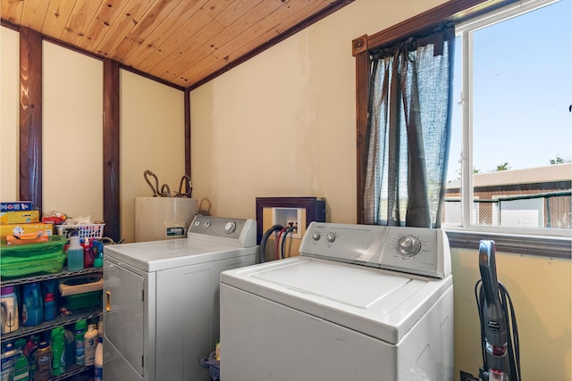2495 Stitt Rd, Mio, MI 48647 - laundry area with water heater, washer and dryer, wooden ceiling, and healthy amount of natural light