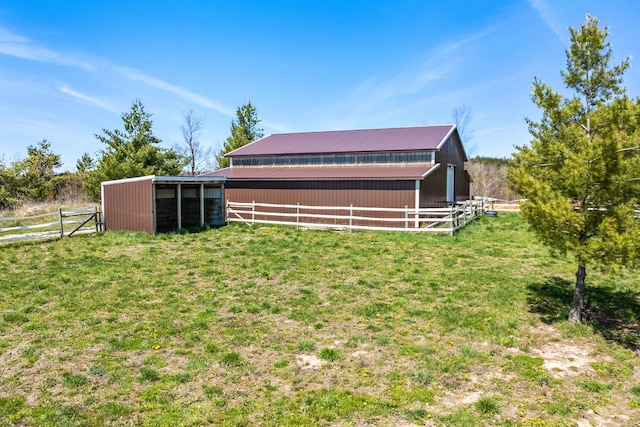 2495 Stitt Rd, Mio, MI 48647 - view of yard with an outdoor structure and an exterior structure