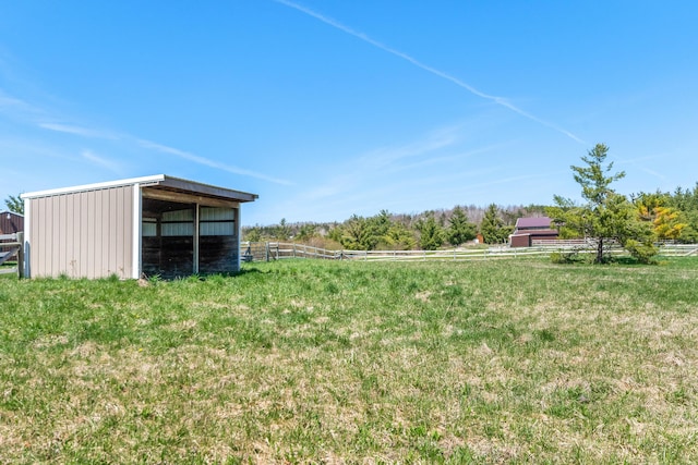 2495 Stitt Rd, Mio, MI 48647 - view of yard with an outbuilding and fence