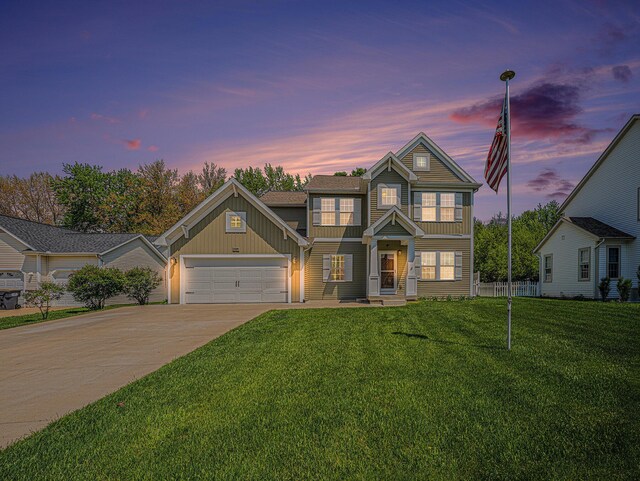 2380 Avalon Woods Dr, Portage, MI 49024 - view of front of property with board and batten siding, concrete driveway, and a garage