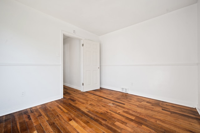 11642 Laing St, Detroit, MI 48224 - empty room with wood finished floors and baseboards