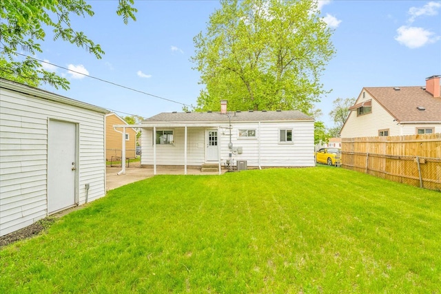 1210 Red Leaf Ln, Ypsilanti, MI 48198 - back of property with a patio area and central air condition unit