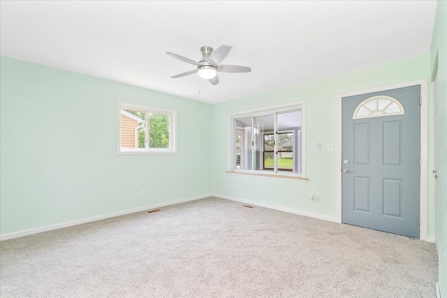 1210 Red Leaf Ln, Ypsilanti, MI 48198 - carpeted foyer entrance with ceiling fan and baseboards