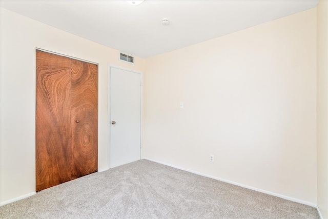 1210 Red Leaf Ln, Ypsilanti, MI 48198 - unfurnished bedroom with carpet flooring, a closet, and baseboards