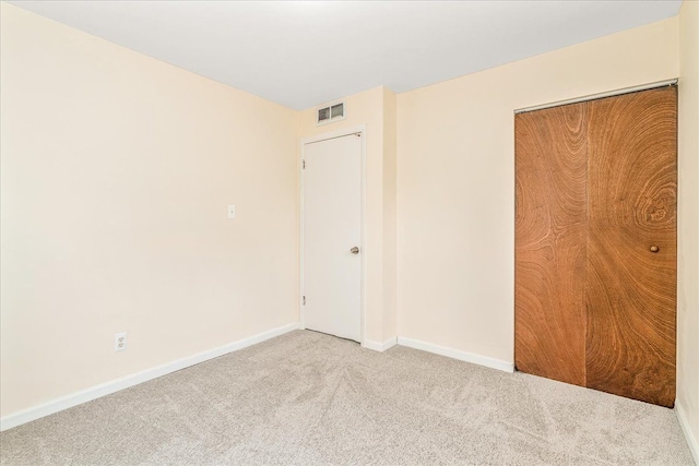 1210 Red Leaf Ln, Ypsilanti, MI 48198 - unfurnished bedroom featuring carpet flooring, baseboards, and a closet