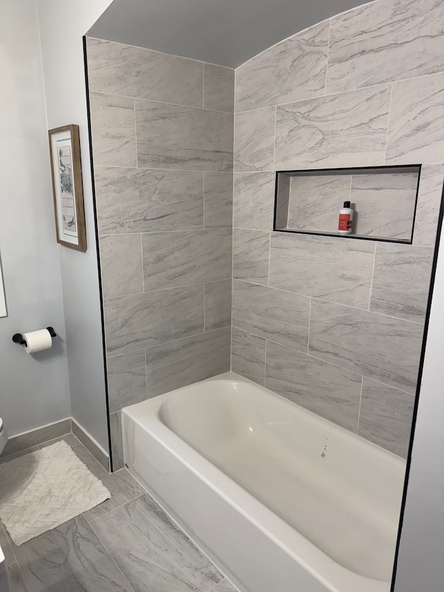 15360 Collinson Ave, Eastpointe, MI 48021 - full bathroom featuring marble look tiles, baseboards, and toilet