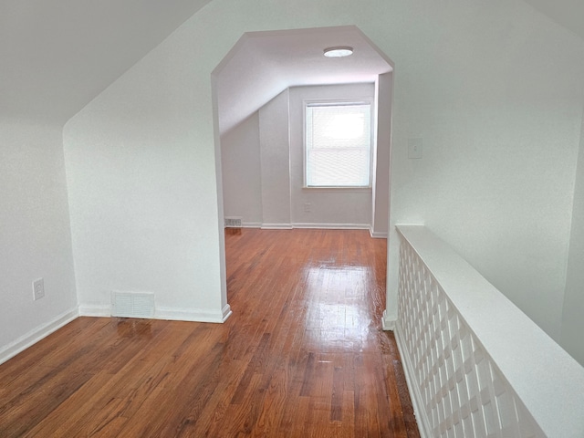 15360 Collinson Ave, Eastpointe, MI 48021 - additional living space featuring wood-type flooring, baseboards, and lofted ceiling