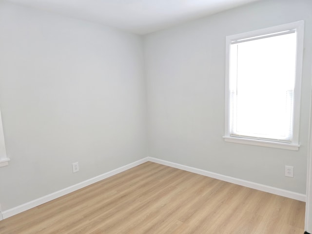 15360 Collinson Ave, Eastpointe, MI 48021 - unfurnished room with light wood-type flooring and baseboards
