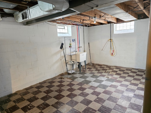 15360 Collinson Ave, Eastpointe, MI 48021 - below grade area featuring dark floors and a sink