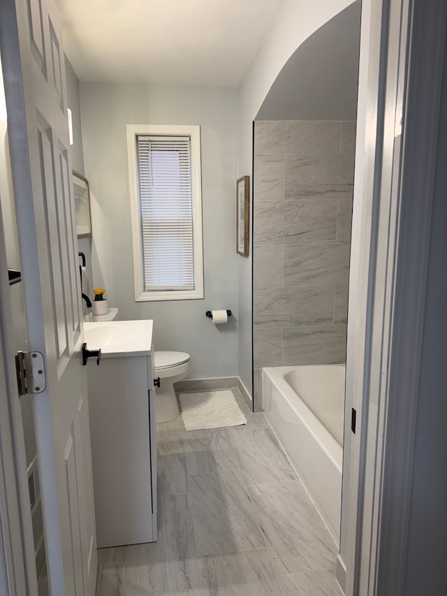 15360 Collinson Ave, Eastpointe, MI 48021 - bathroom with marble finish flooring, baseboards, vanity, and toilet