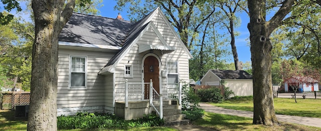 tudor house with a shingled roof