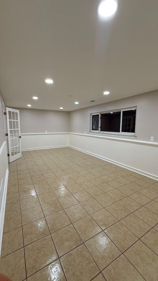 4425 Westpoint St, Dearborn Heights, MI 48125 - empty room featuring light tile patterned floors, recessed lighting, and baseboards