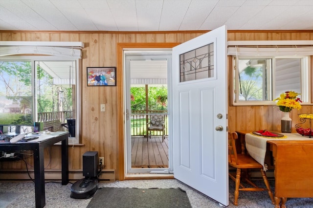 716 Allen St, Caro, MI 48723 - doorway to outside with wood walls, healthy amount of natural light, a desk, carpet floors, and ornamental molding