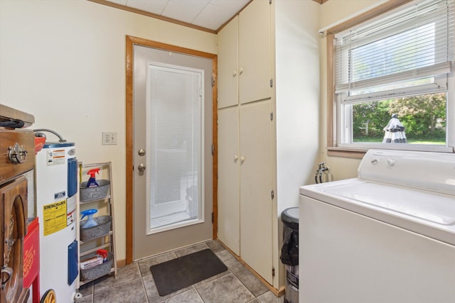 716 Allen St, Caro, MI 48723 - laundry area featuring washer / clothes dryer, water heater, and ornamental molding
