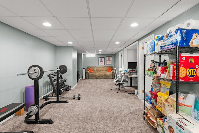 workout room with carpet flooring, recessed lighting, a drop ceiling, and baseboards