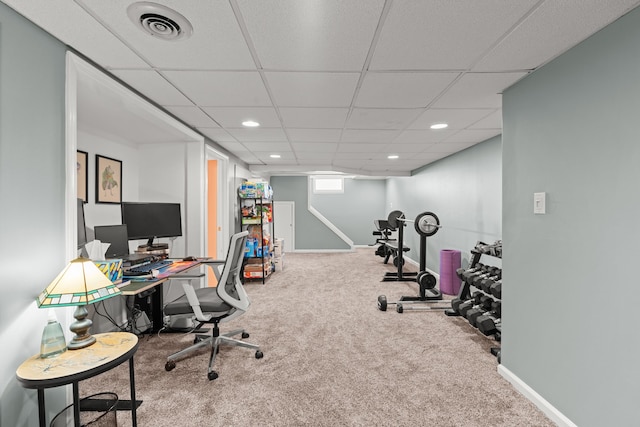 carpeted office space featuring recessed lighting, baseboards, and a drop ceiling
