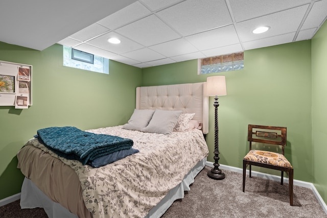 bedroom featuring carpet, baseboards, recessed lighting, and a drop ceiling