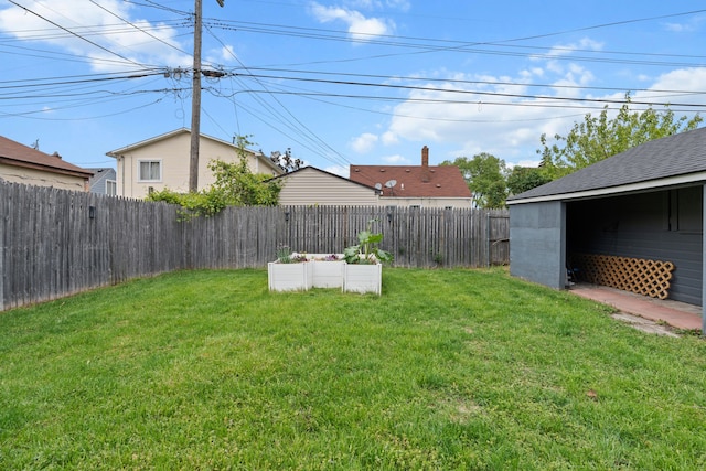 view of yard featuring a vegetable garden